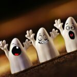 Poker ghost image: three ghost figurines with different expressions