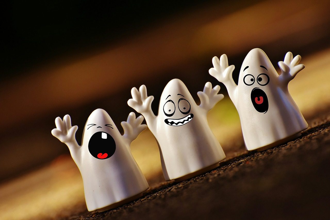 Poker ghost image: three ghost figurines with different expressions